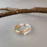 Dual tone overlap cuff